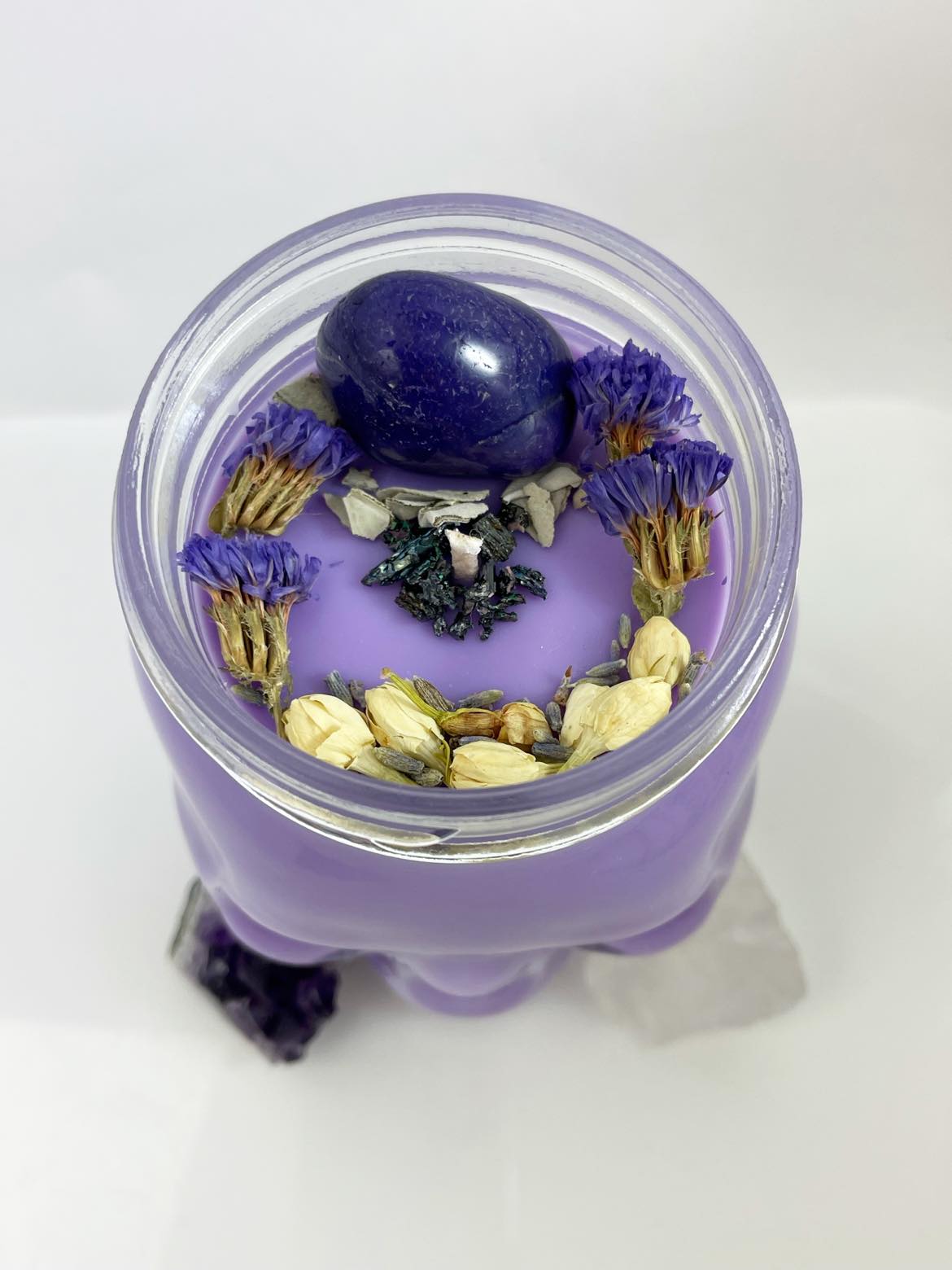 Spiritual Crystal – Purple Glass Skull Candle, top view